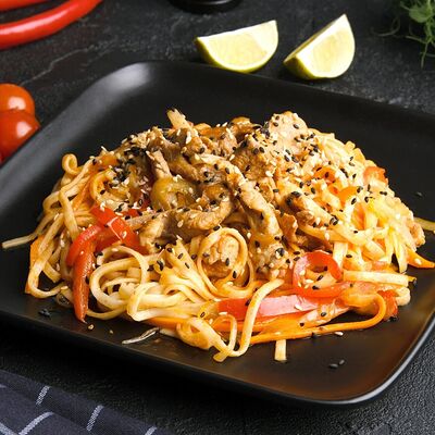 Лапша удон со свининой в ProSushi по цене 379 ₽