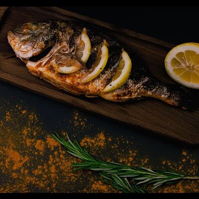 Дорадо на мангале в Вкус огня по цене 1100 ₽