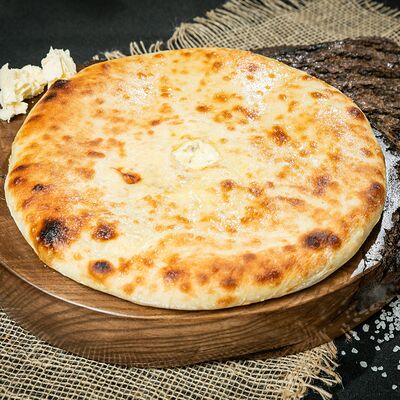 Осетинский пирог с картошкой и сыром 28 см в Пицца Пала по цене 615 ₽