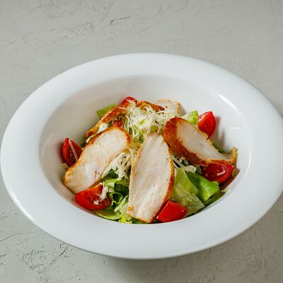 Салат Цезарь с курицей в Kosta пицца по цене 100 ₽