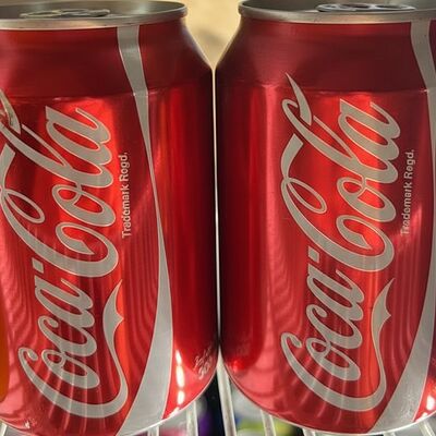 Кола жестяная банка в Laksa & Wok по цене 250 ₽