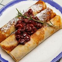 Блины с вишней и кремом в Base coffee