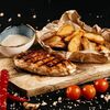 Стейк из куриной грудки с картофельными дольками в MOOD по цене 570
