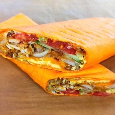 Шаурма в сырном лаваше с курицейв Кафе нут по цене 390 ₽