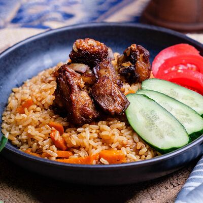 Плов Узбекский в Кафе кавказской кухни Хурма по цене 365 ₽