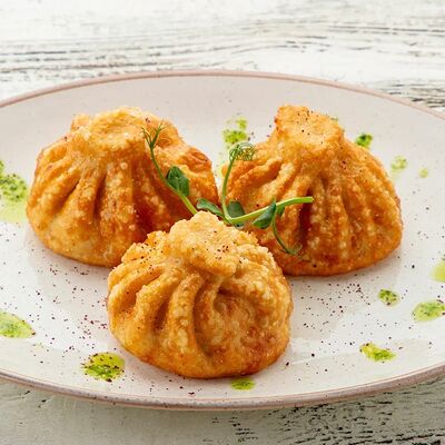 Жареные хинкали в Чили пицца по цене 430 ₽