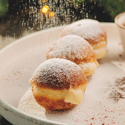 Пончики бомболони с мандариновым джемом в Перчини на огне по цене 230