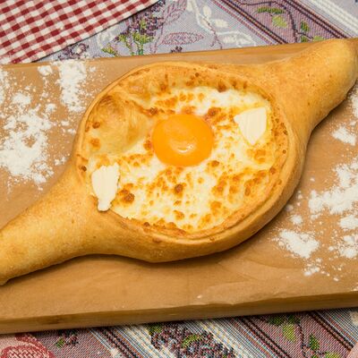 Хачапури по-аджарски в Гурман студия по цене 450 ₽