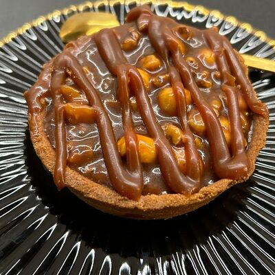 Тарталетка карамельно-ореховая в Hancoffe по цене 260 ₽