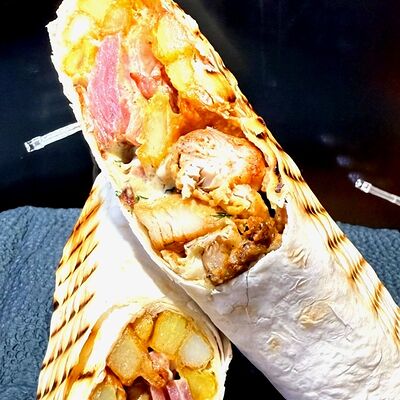 Шаурма сытная на сырном лавашев Grill shau по цене 550 ₽