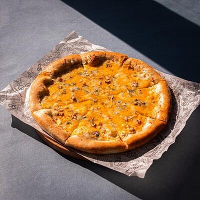 Пицца Четыре сыра в Feromon по цене 750 ₽