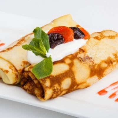 Блинчики фаршированные с курагой и творогом в Максимилианс по цене 340 ₽