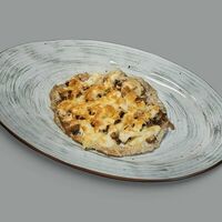 Филе цыплёнка с шампиньонами под сыром в Лукоморье