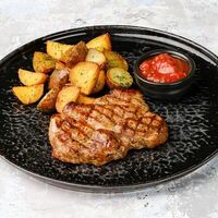 Стейк из cвинoй шеи в Casa Mia Халва Тсуру