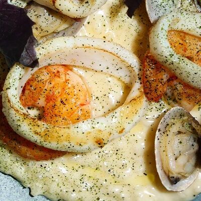 Лимонный ризотто с морепродуктамив Gino Cafe по цене 1100 ₽
