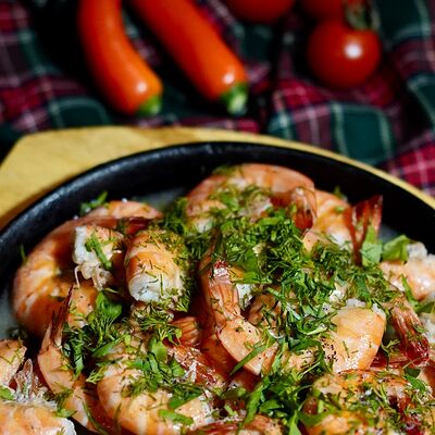 Тигровые креветки в сливочном соусе в Harats pub по цене 1400 ₽