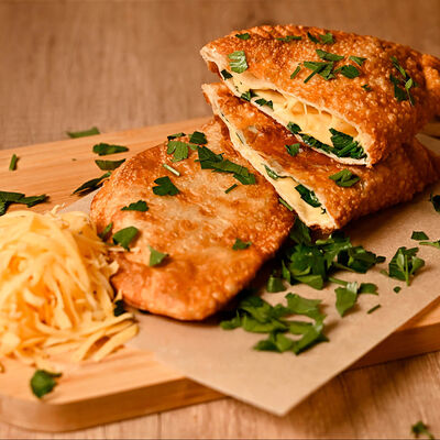 Чебуссэр с сыром и зеленью в Чебуссэр по цене 325 ₽