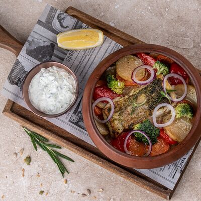Судак, запеченный с овощами и огуречным соусом в Русская усадьба по цене 1210 ₽