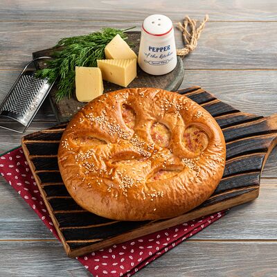 Пирог с ветчиной и сыром в Пышнотесто по цене 460 ₽