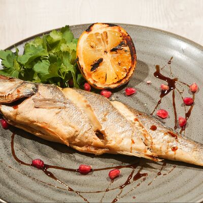 Рыба на углях Сибас в Троя по цене 1150 ₽