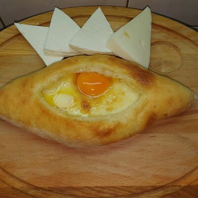 Хачапури по-аджарски в Хинкальная по цене 550 ₽