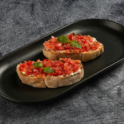 Брускетта с томатами и рикоттой в BeerLogovo по цене 280 ₽