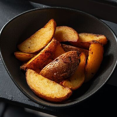 Картофельные дольки в Густо & Пряно по цене 228 ₽