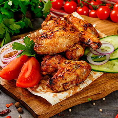 Куриные крылья в Арабская шаурма по цене 380 ₽