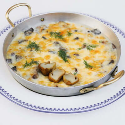 Лесные грибы, запечённые под сыром в Обломов по цене 1260 ₽