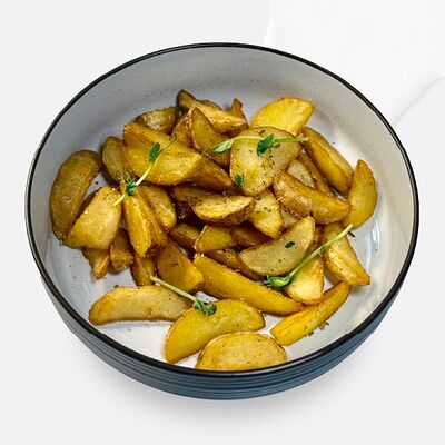 Картофель по-деревенски в Caviar по цене 350 ₽