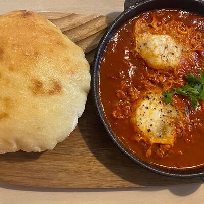 Шакшука с питой в Разные Зерна по цене 520 ₽