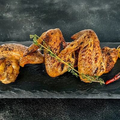 Куриные крылышки на мангале в Пито-Грильто по цене 480 ₽