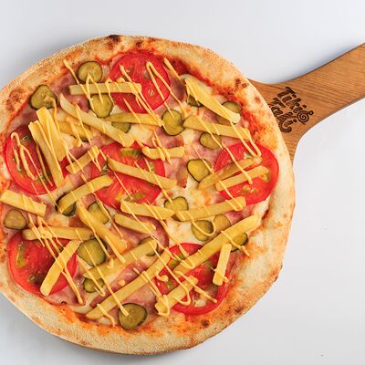 Пицца Фирменная Tiki-Taki 28см в Семейный ресторан Tiki&Taki по цене 700 ₽