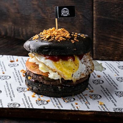 Черный бургер в Мангал по цене 450 ₽