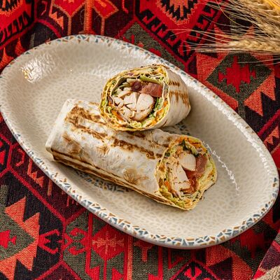 Шаурма с цыпленкомв Хмели & Сунели по цене 610 ₽