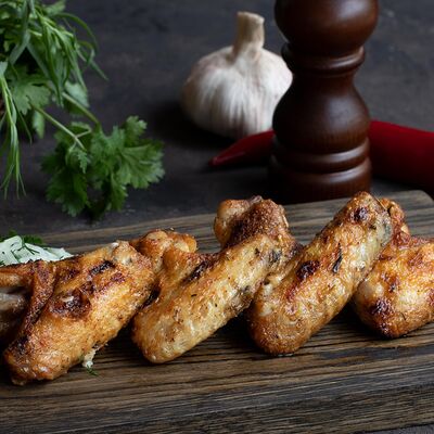 Куриные крылья в Arts - food по цене 510 ₽