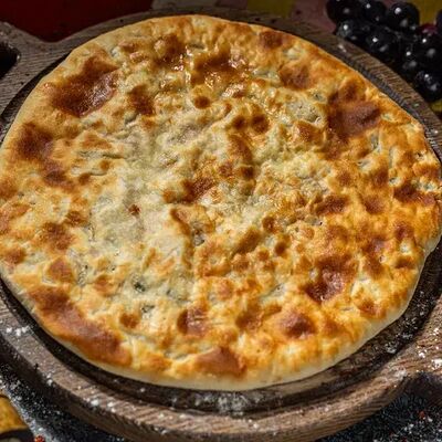 Хачапури с курицей и сулугуни в Хачапури по цене 690 ₽