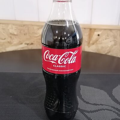 Coca-Cola в Вкусная точка по цене 130 ₽