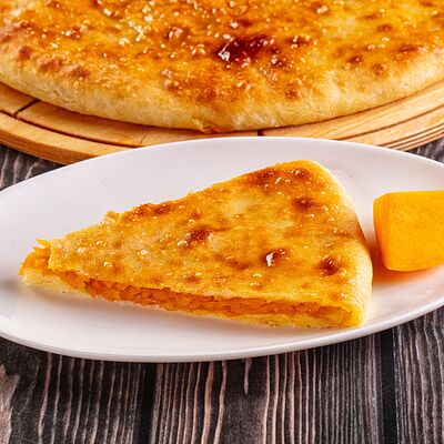 Осетинский пирог с тыквой в Осетинские Пироги по цене 1100 ₽