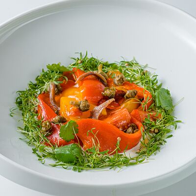 Томатный салат с печёным перцем и муссом из фетыв Cafe Imperial по цене 1200 ₽