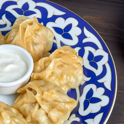 Манты с курицей и грибами в Фьюжн по цене 560 ₽