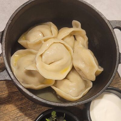 Пельмени с дичью в бульонев Чкалов. Северная кухня по цене 450 ₽