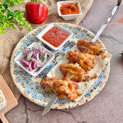 Шашлык из куриных крыльев в Чайхана Азия Базар по цене 460