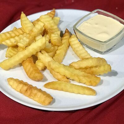 Картофель фри с сырным соусом в Вино и еда по цене 390 ₽