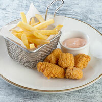 Куриные наггетсы с пикантным соусом в Пицца Темпо