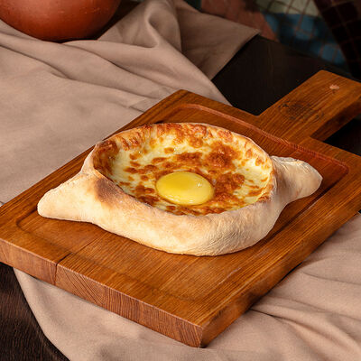 Хачапури по-аджарски в Аджикинежаль по цене 620 ₽