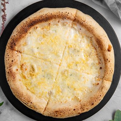 Пицца четыре сыра в Zero pizza по цене 930 ₽