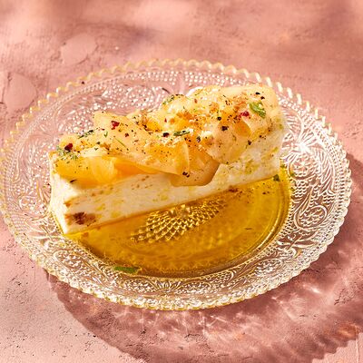 Чизкейк с маринованной грушей и маслом гвоздики в KITCHEN по цене 290 ₽