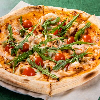 Пицца Сливочная с морепродуктами в Oreganos по цене 720 ₽