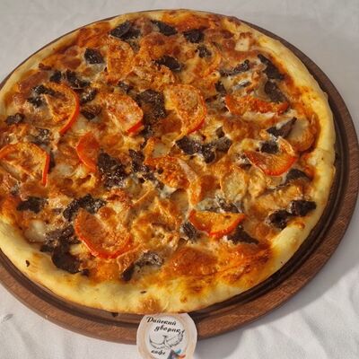 Пицца с курицей и говядиной в Райский дворик по цене 700 ₽